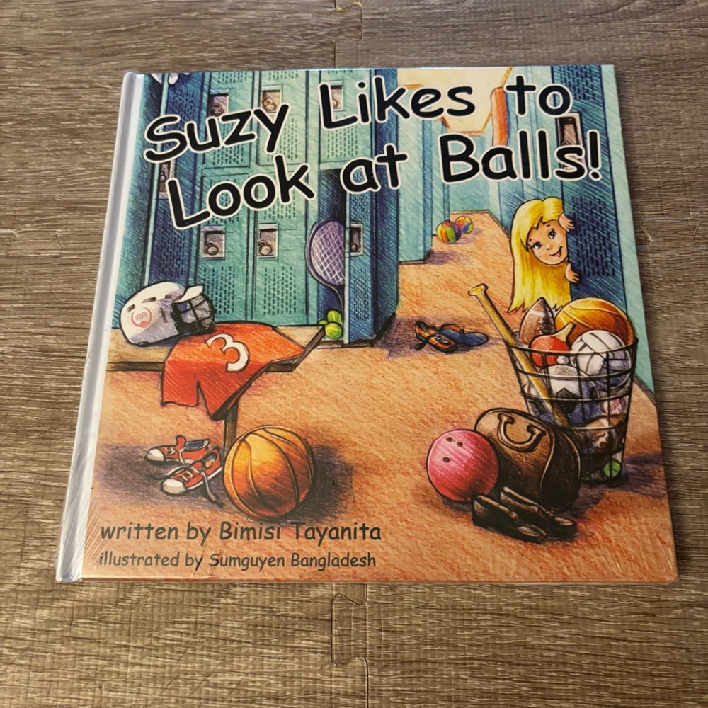 Suzy Likes to Look at Balls! Children’s Book - Yellow & Blue Cover